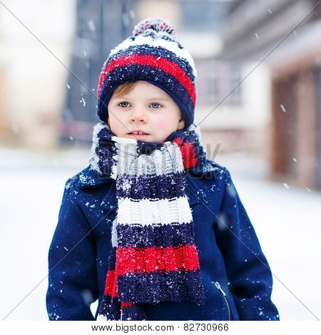 Little Boy Playing With Snow In Winter, Outdoors.
