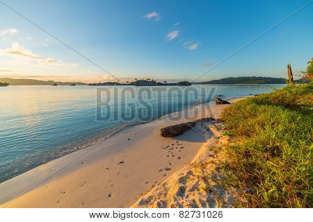 Golden Sunrise On Desert Beach