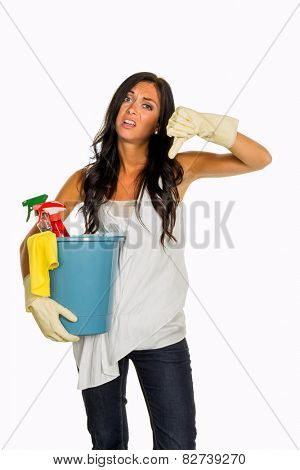 a young woman is annoyed that she has to make the house cleaning.