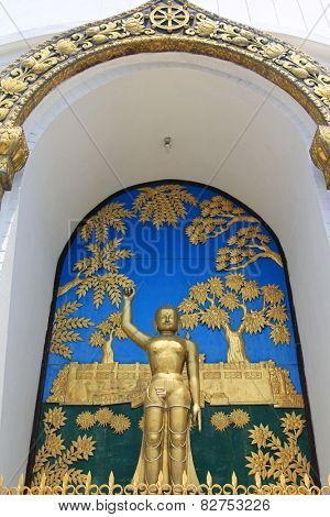 POKHARA, NEPAL - APRIL 2014 : A bronze statue representing Siddhartha's birth, housed in World Peace Pagoda on 15 April 2014 in Pokhara, Nepal. Shanti Stupa was built in 1996 as a symbol of peace. 