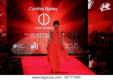 NEW YORK-FEB 12: Cynthia Bailey wears Jovan O'Connor at Go Red for Women-The Heart Truth Red Dress Collection during Mercedes-Benz Fashion Week at Lincoln Center on February 12, 2014 in New York City.