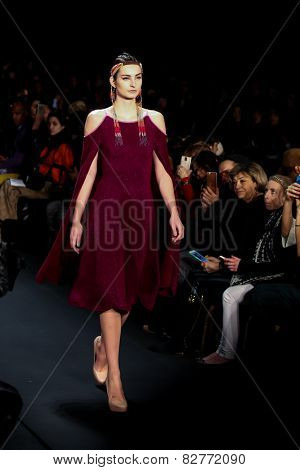 NEW YORK - FEBRUARY 13: A model walks the runway at the Mongol Fall/Winter 2015 collection during Mercedes-Benz Fashion Week in New York on February 13, 2015.