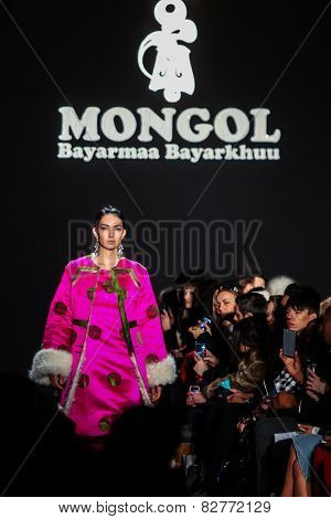 NEW YORK - FEBRUARY 13: A model walks the runway at the Mongol Fall/Winter 2015 collection during Mercedes-Benz Fashion Week in New York on February 13, 2015.