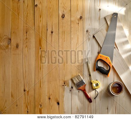Wood Floor With A Brush, Paint And Tools