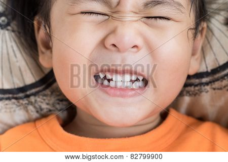 Close Up Funny Face Of Children Toothy Acting