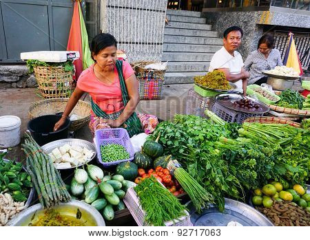 Burmese Women Selling Fresh Fruits At Bogyoke Market