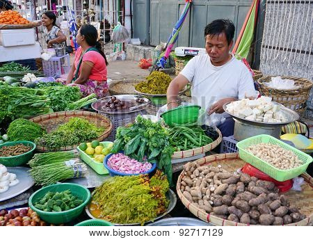 Burmese Women Selling Fresh Fruits At Bogyoke Market