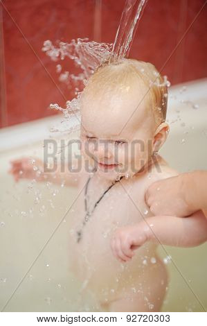 The Baby On The Head Of Grist. Bathing Baby