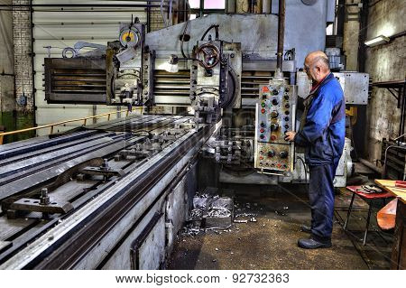 Machine Tool Operator Planing And Milling Double Column.