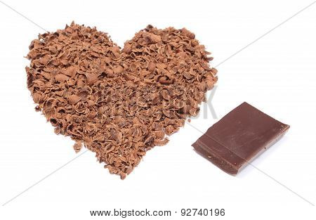 Heart Shaped Grated Chocolate On White Background