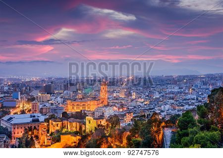 Malaga, Spain cityscape at the Cathedral, City Hall and Alcazaba citadel of Malaga.