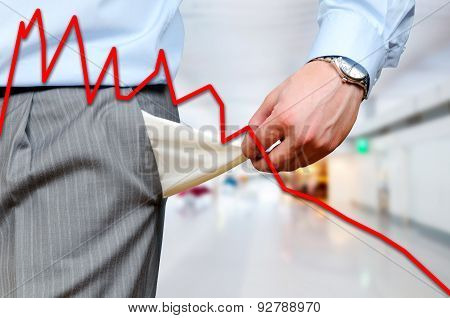 Man pulling out empty pockets