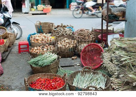 asian street market basket red chilly pepper greens
