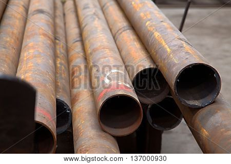 Rusty tubes in the ground