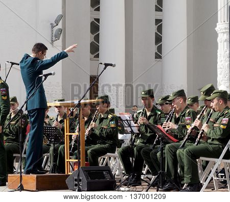MOSCOW, RUSSIA - May 28, 2016: Band-master during a performance. Central Avenue in the Park of VDNH Moscow. International Military Music Festival 