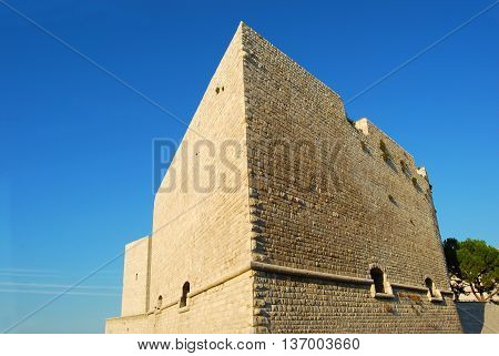 The mighty walls of the Castle Svevo Trani in Apulia - Italy