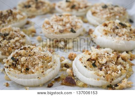 white onions stuffed and gratineed with bredacrumbs and aromatic herbs