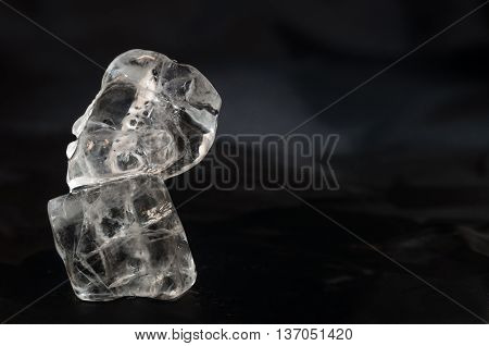 Ice cubes isolated over a black background