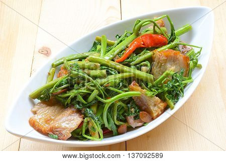 close up Fried Water minosa with crispy pork