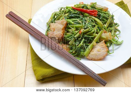 close up Fried Water minosa with crispy pork