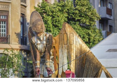 Bucharest, Romania - June 10, 2016: Golden Angel & Sol theater show at B-FIT. B-FIT is a cultural event that involves international artists and acrobats who act in theater plays on street.
