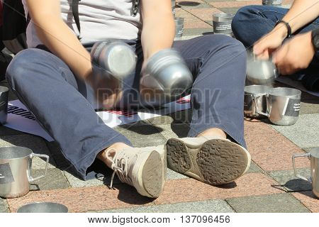 Kiev Ukraine - July 5 2016: Public activists rattling the cups of prison to parliament voted for arrest an escaped politician Alexander Onishchenko in Russia near the building of the Verkhovna Rada of Ukraine