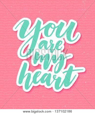 You are my heart. Romantic inspirational quote for valentines day cards, greetings, t-shits and wall art posters. Vector turquoise calligraphy on pink grunge background.