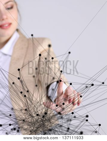 Worldwide network or wireless internet connection futuristic concept. Woman working with linked dots.