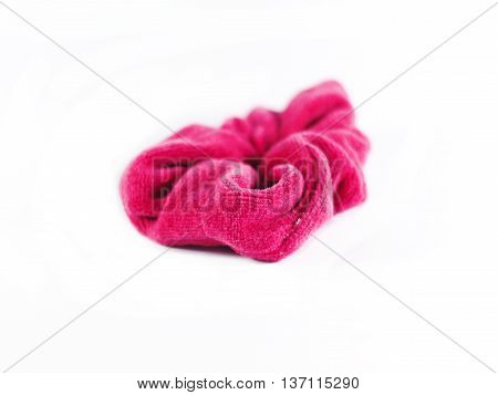 Pink soft velvet hair band isolated on white