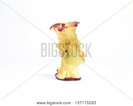 Red apple eaten to the core isolated on white background