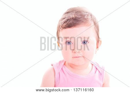 Baby girl with pink romper on white background.