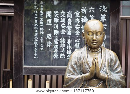 The Nade Botoke sculpture in Senso-ji Temple, Tokyo