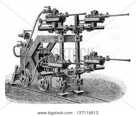 Perforator Burton with water injection lance, vintage engraved illustration. Industrial encyclopedia E.-O. Lami - 1875.