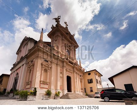 BRUNATE, ITALY - MAY 2016: St. Andrew the Apostle Church is a sacred building site in Brunate, in the province of Como. Scenic arhitectural background. Europe.