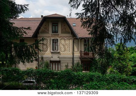 BRUNATE, ITALY - MAY 2016: villas in eclectic and art nouveau style spread to the area and surrounded by magnificent parks