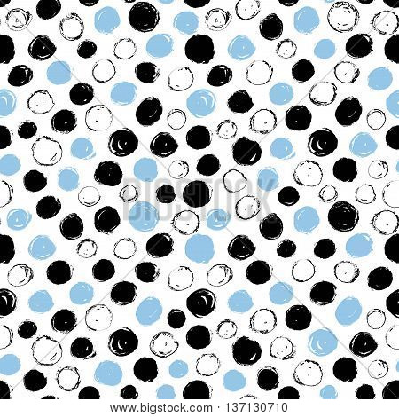 Seamless pattern with black and blue circles. Polka dots pattern. Ink illustration. Hand drawn artistic elements. Ornamental texture for your wrapping paper.