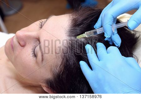 Procedure of anti hair loss injection in clinic