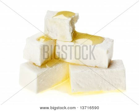 Feta ost terninger med olivenolie dråber