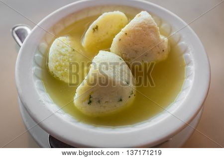 Delicious Matzoh ball soup Jewish traditional cuisine