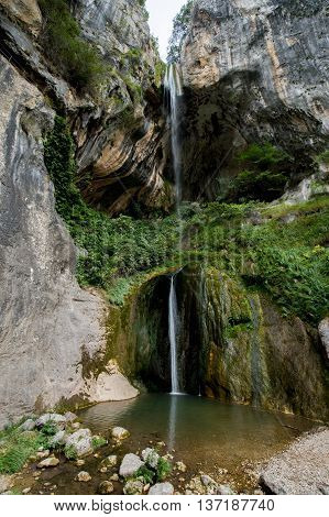 waterfall water rock green grass summer stone