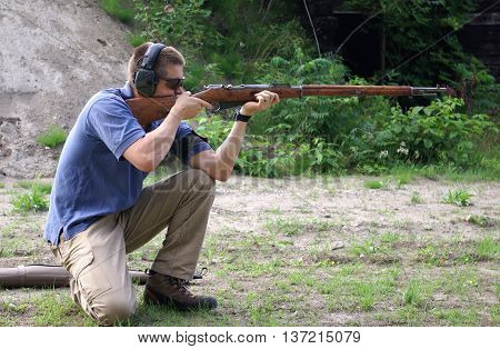 Firing a Mocin on the range in the kneeling