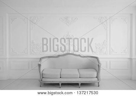 Antique white sofa fretwork wall on backround