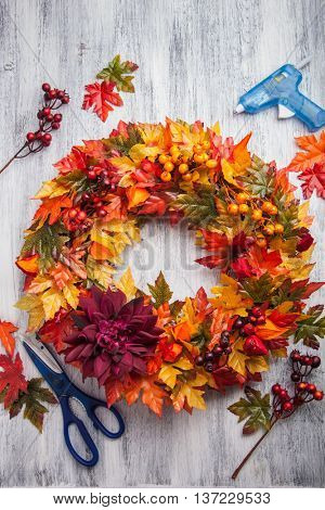 handmade diy artifical autumn wreath decoration with leaves berry flower