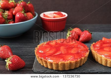 Chocolate Tart, Tartalette With White Chocolate And Mascarpone Cream, Fresh Strawberries On Top. Lar