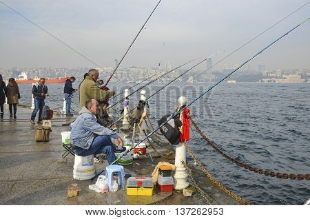 Istanbul Turkey - November 9 2014: Istanbul at the Bosphorus bonito bluefish mackerel sardines sea bass and other bottom fish hunt. Migration time increases in fishing catch fish.