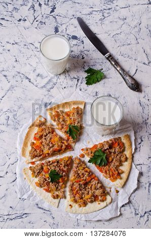 Traditional Asian thin tortilla with minced meat and vegetables. Selective focus.