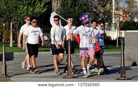 Washington DC - April 12. 2014: A group of parading students walking across the East plaza of the U.S. Capitol