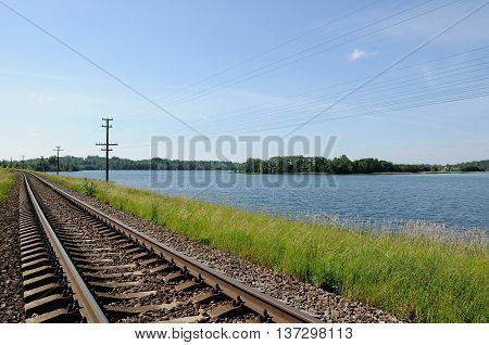 railway track along the coast of the beautiful lake