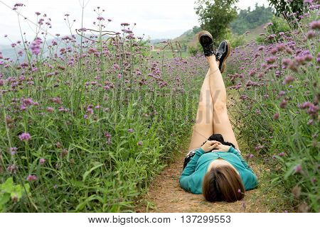 Woman Sit  In Verbena  Bonariensis