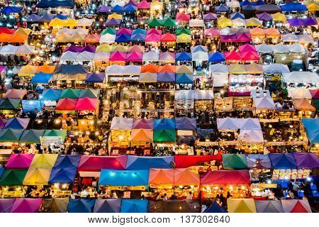Colorful Food Stalls At Rod Fai Night Market In Bangkok, Thailand, Day To Night Time-lapse.